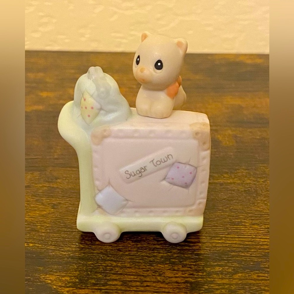 Retired Precious Moments Figurine.
